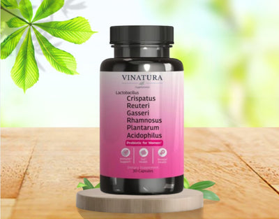 A bottle of Vinatura Women Probiotics on a wooden stand.